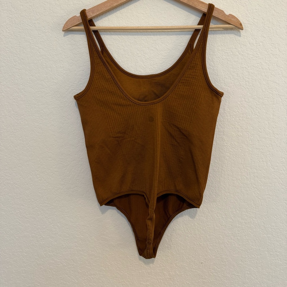 Lululemon Ebb to Street Bodysuit *Light Support, B/C Cups
Copper Brown Size 6 - Picture 3 of 6